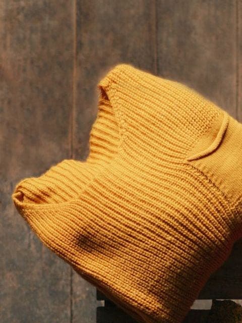 Folded mustard knit sweater